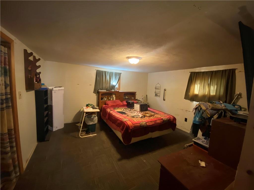 290 Calverts Hill Road Spraggs, PA 15362 - Photo 16 of 22 a bedroom with furniture and a flat screen tv