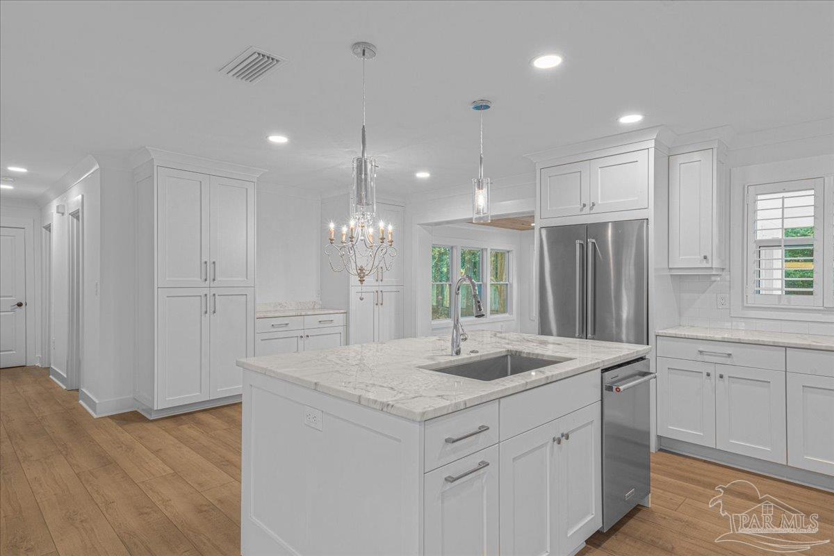 3540 Dunfries Road Pensacola, FL 32503 - Photo 15 of 48 a bathroom with a sink double vanity and a shower