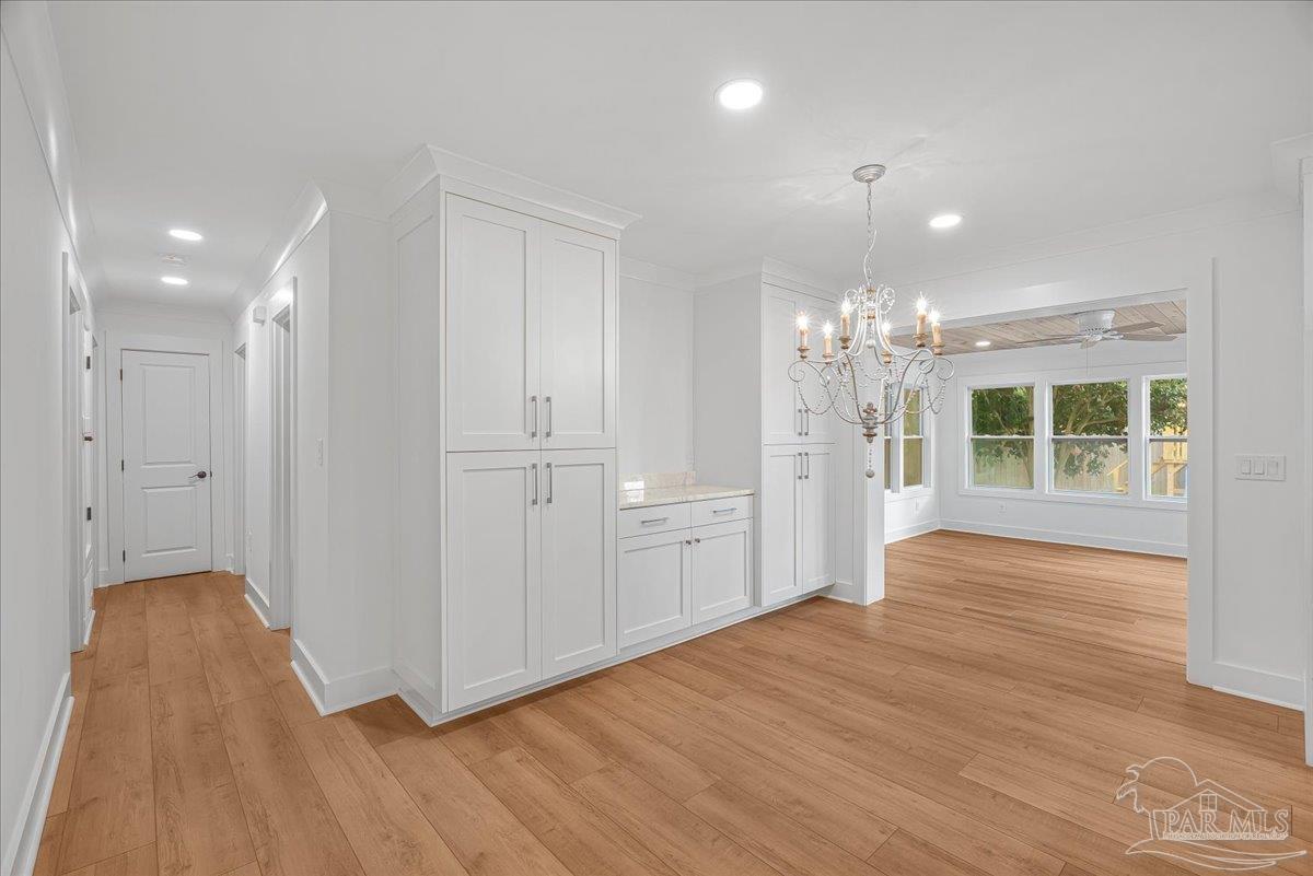 3540 Dunfries Road Pensacola, FL 32503 - Photo 18 of 48 a view of a livingroom with wooden floor