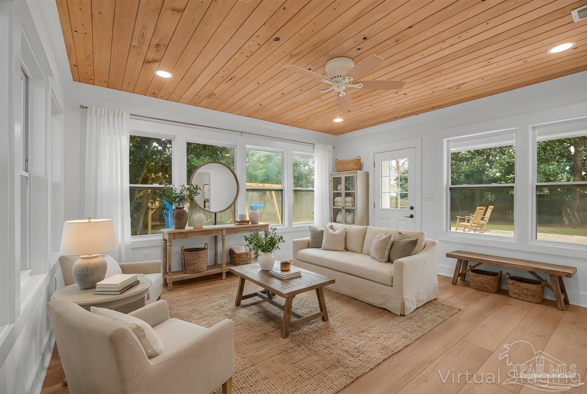 3540 Dunfries Road Pensacola, FL 32503 - Photo 22 of 48 a living room with furniture and a large window