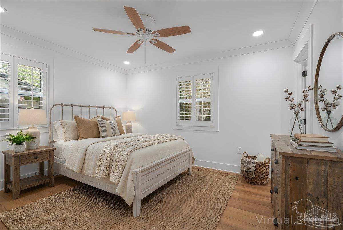 3540 Dunfries Road Pensacola, FL 32503 - Photo 34 of 48 a bed room with a bed and a chandelier