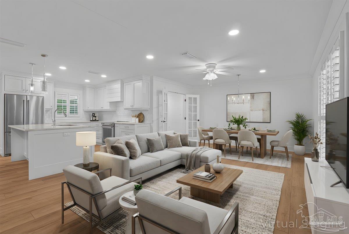 3540 Dunfries Road Pensacola, FL 32503 - Photo 8 of 48 a living room with furniture kitchen and a table