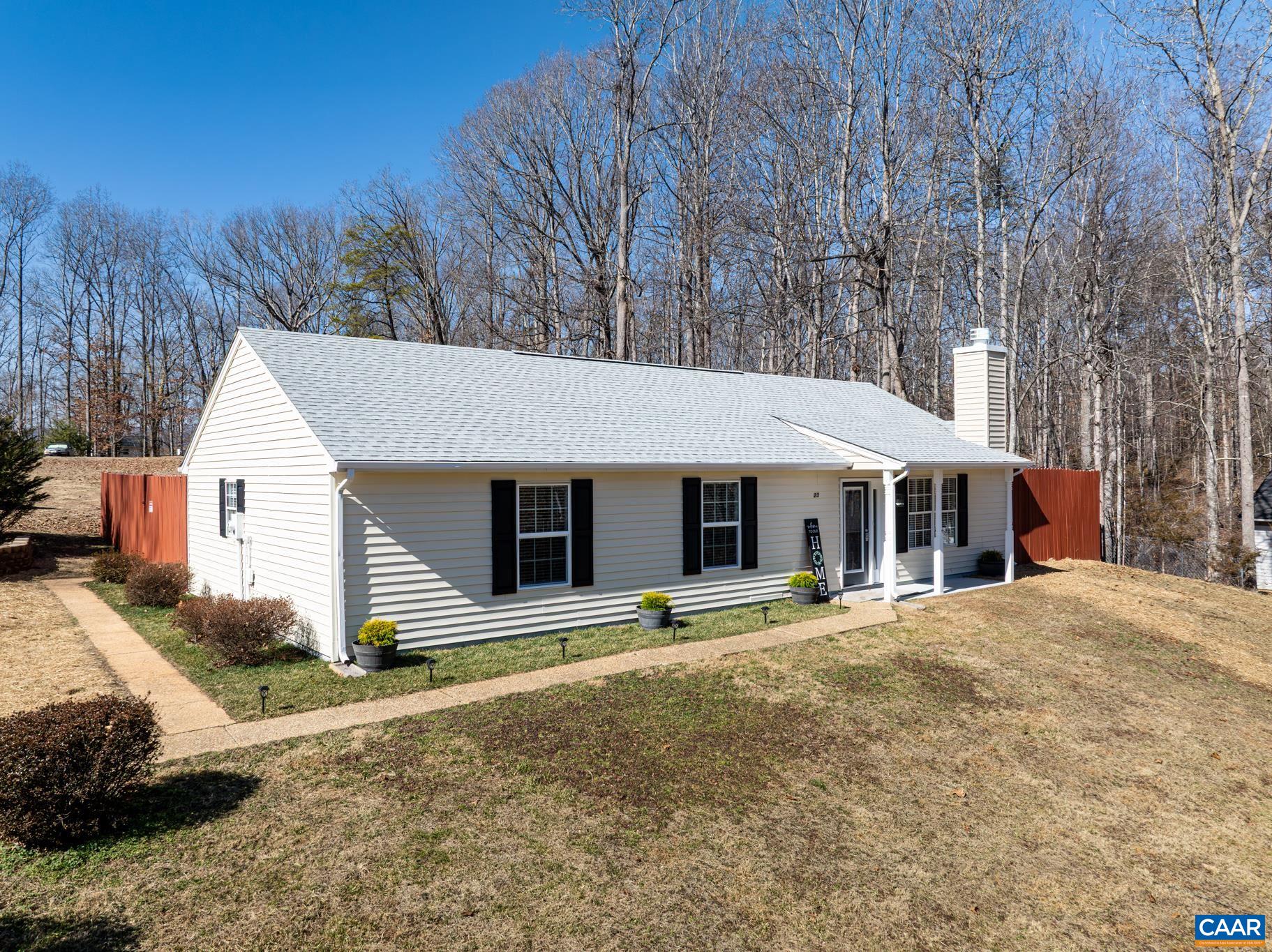23 North Ridge Way Stanardsville, VA 22973 - Photo 1 of 19 a front view of a house with a yard