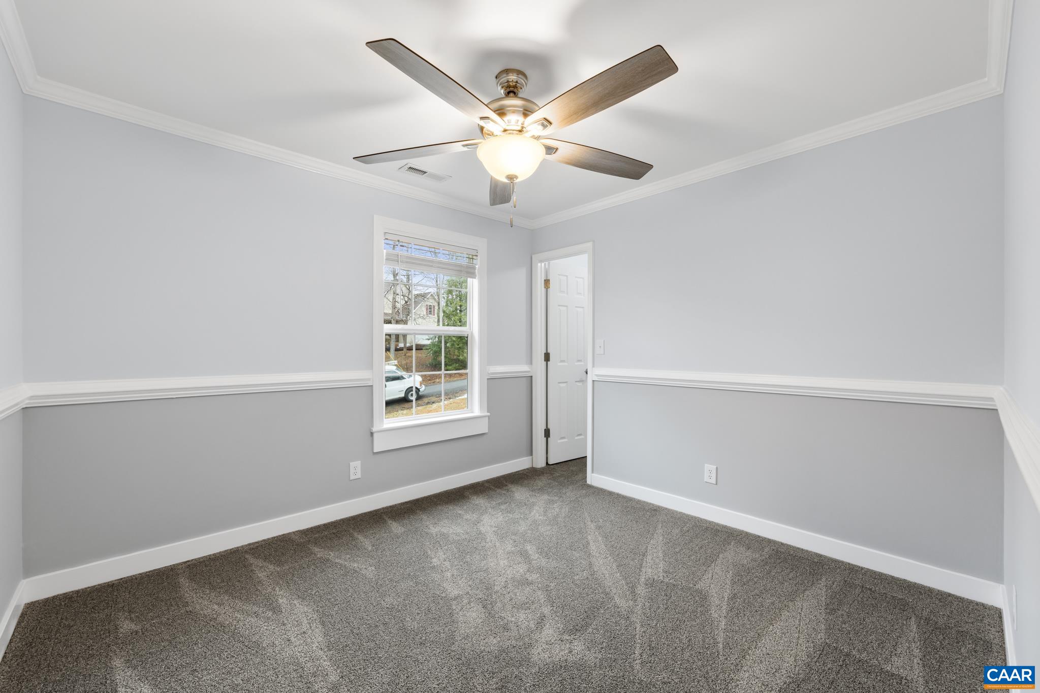 23 North Ridge Way Stanardsville, VA 22973 - Photo 16 of 19 an empty room with windows and ceiling fan