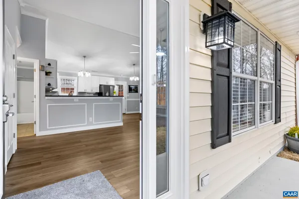 a view of a kitchen from the hallway