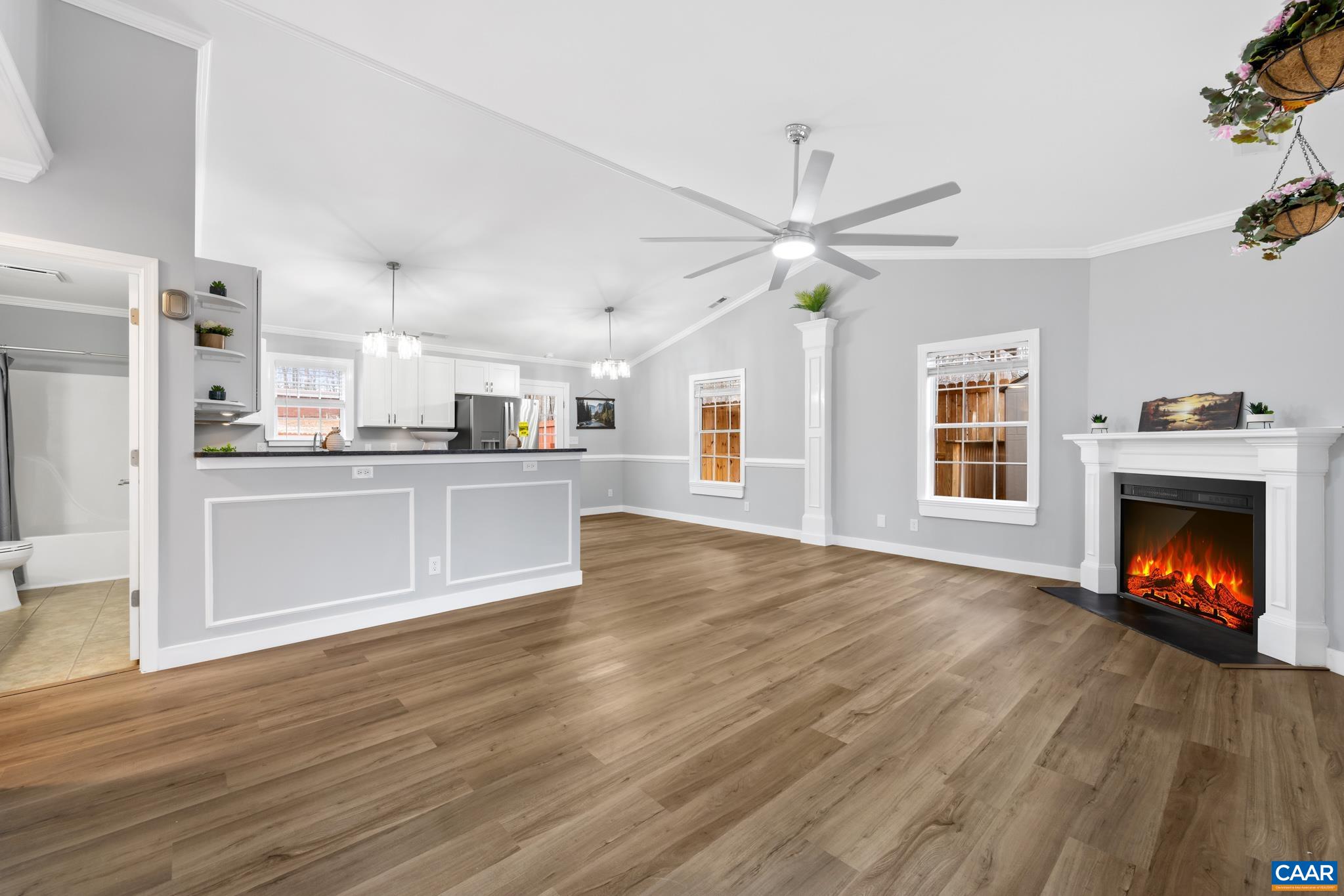 23 North Ridge Way Stanardsville, VA 22973 - Photo 4 of 19 a view of an empty room with kitchen and fireplace