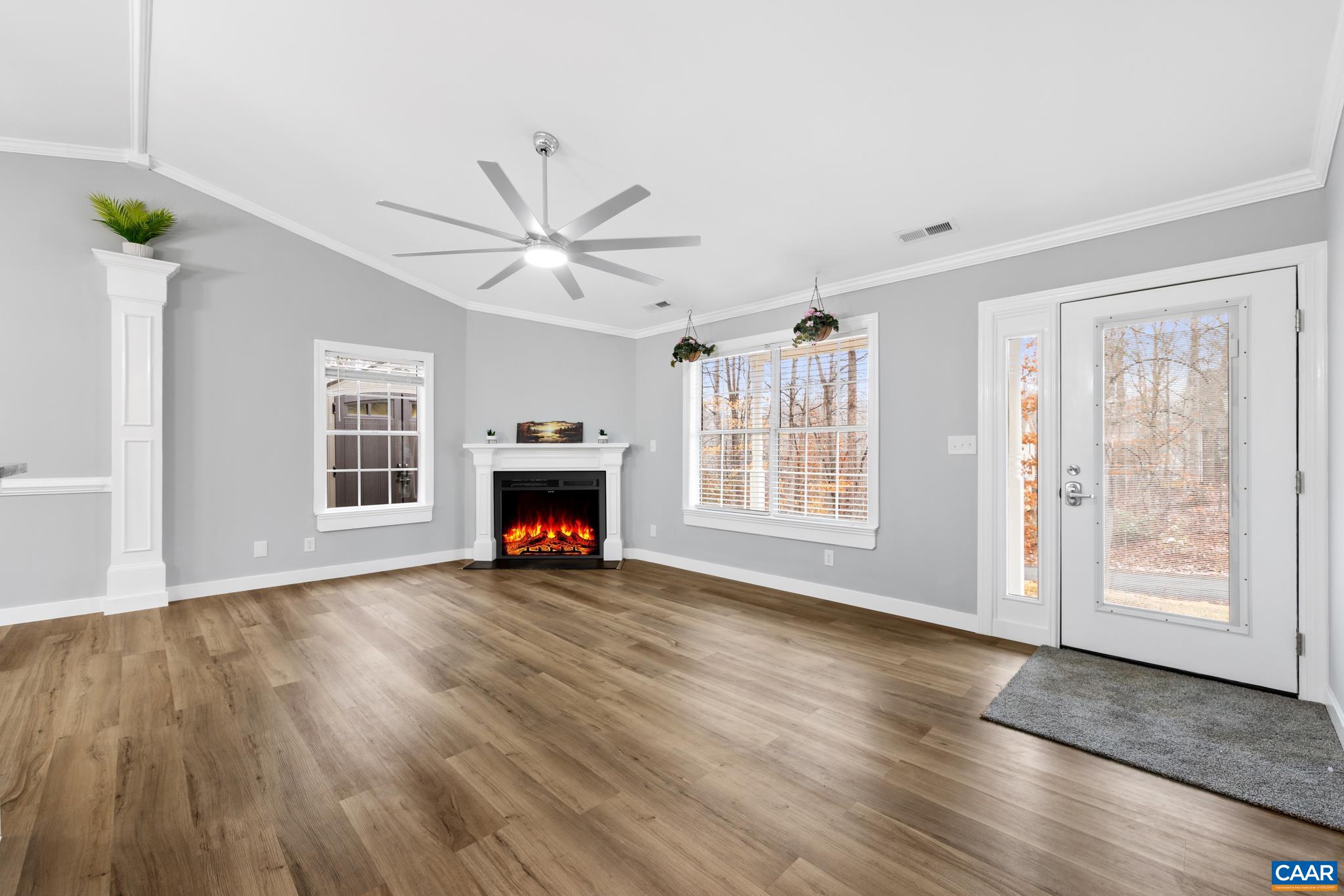 23 North Ridge Way Stanardsville, VA 22973 - Photo 5 of 19 a view of an empty room with wooden floor and a window