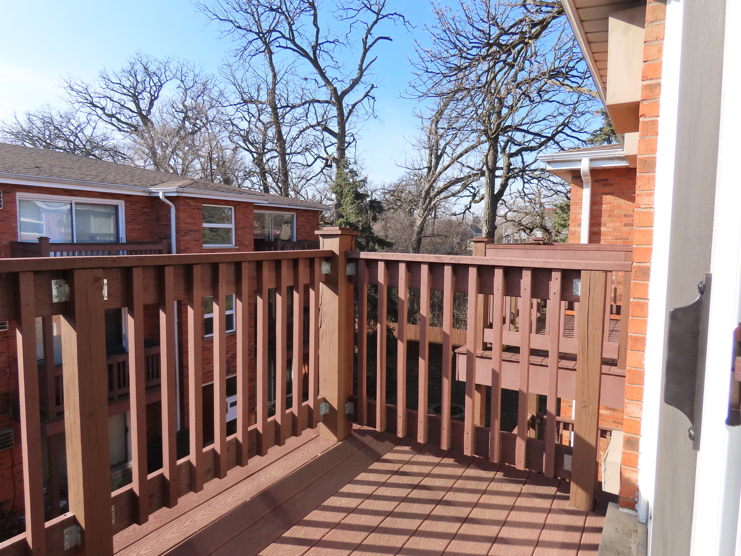 14830 Ketelaar Drive, Unit 4E Midlothian, IL 60445 - Photo 19 of 23 a view of small deck with wooden fence