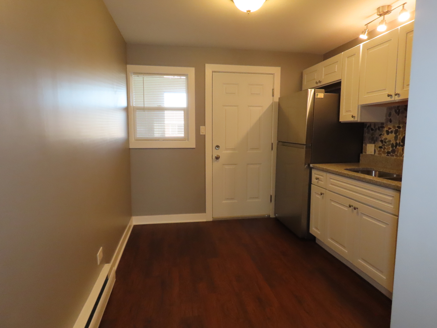 14830 Ketelaar Drive, Unit 4E Midlothian, IL 60445 - Photo 9 of 23 a view of a refrigerator in kitchen and a sink