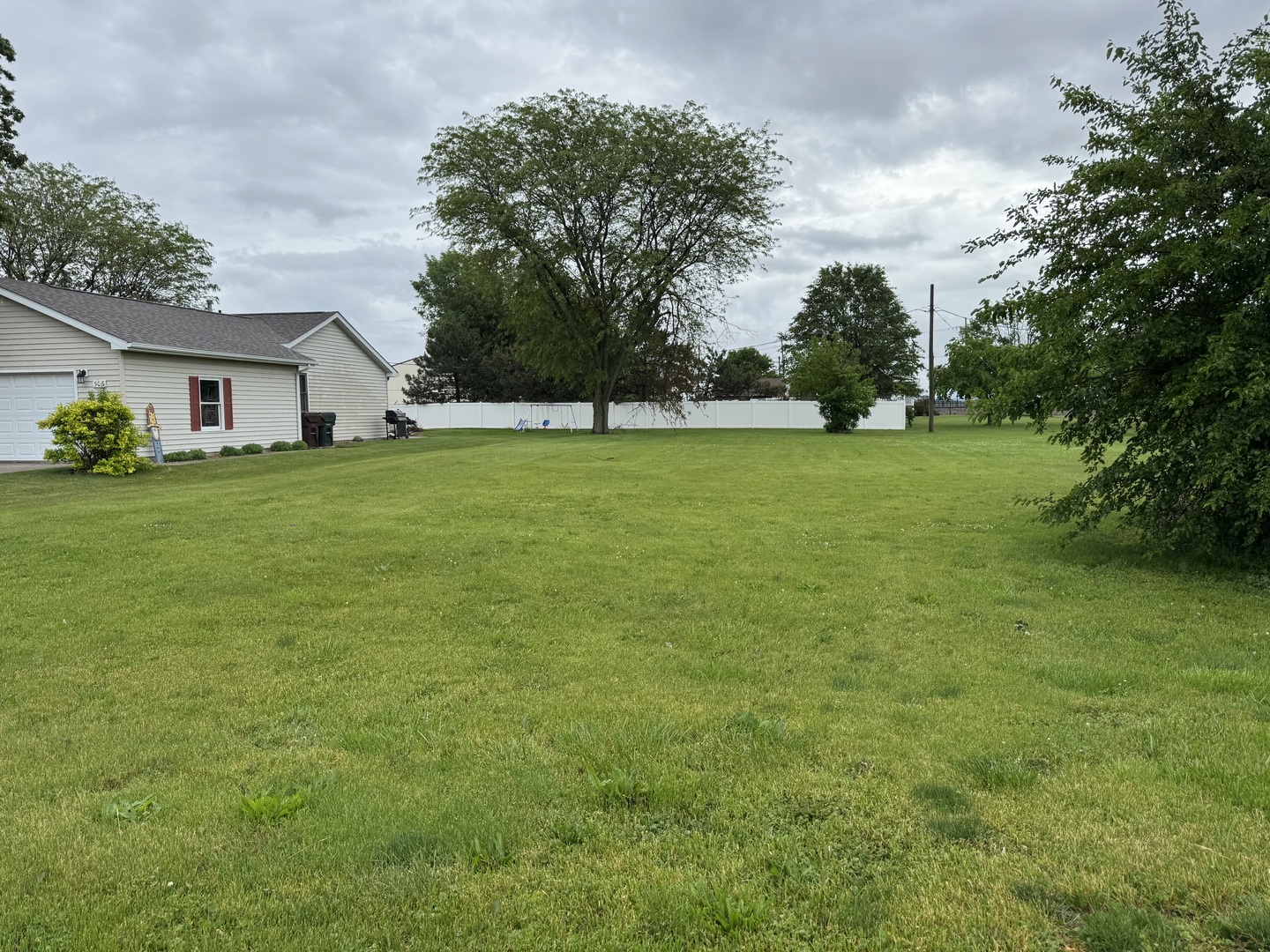 504 North Pine Street Gardner, IL 60424 - Photo 3 of 6 a view of a field of grass and trees