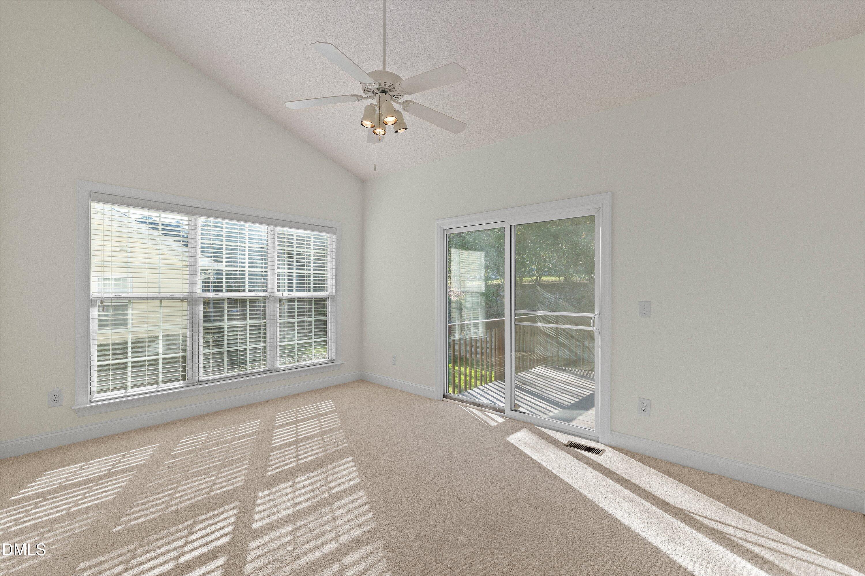 105 Rockport Ridge Way Cary, NC 27519 - Photo 21 of 43 a view of an empty room with a window