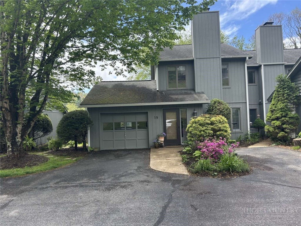 a front view of house with yard