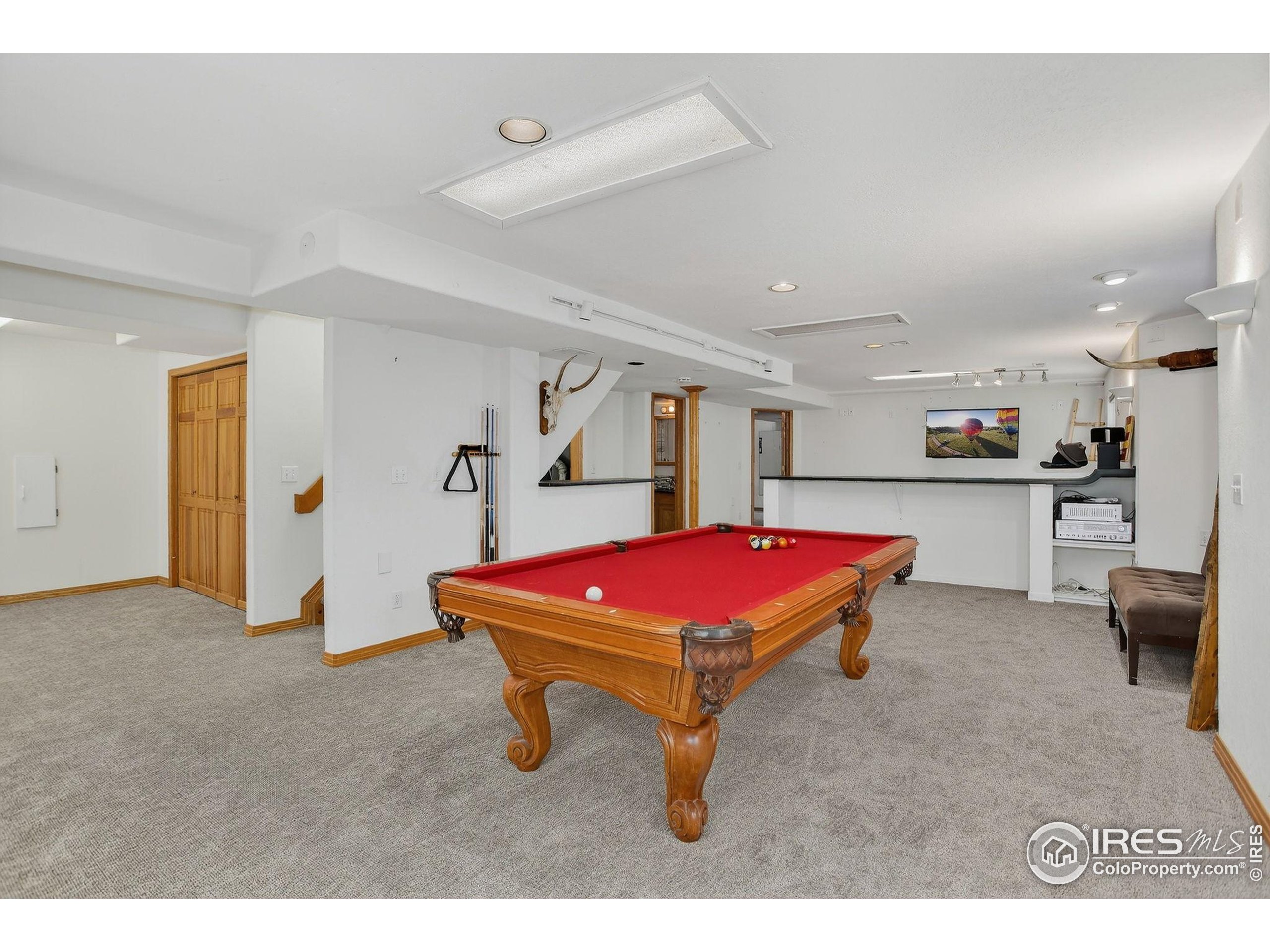 1840 Red Cloud Road Longmont, CO 80504 - Photo 28 of 42 a room with furniture and pool table