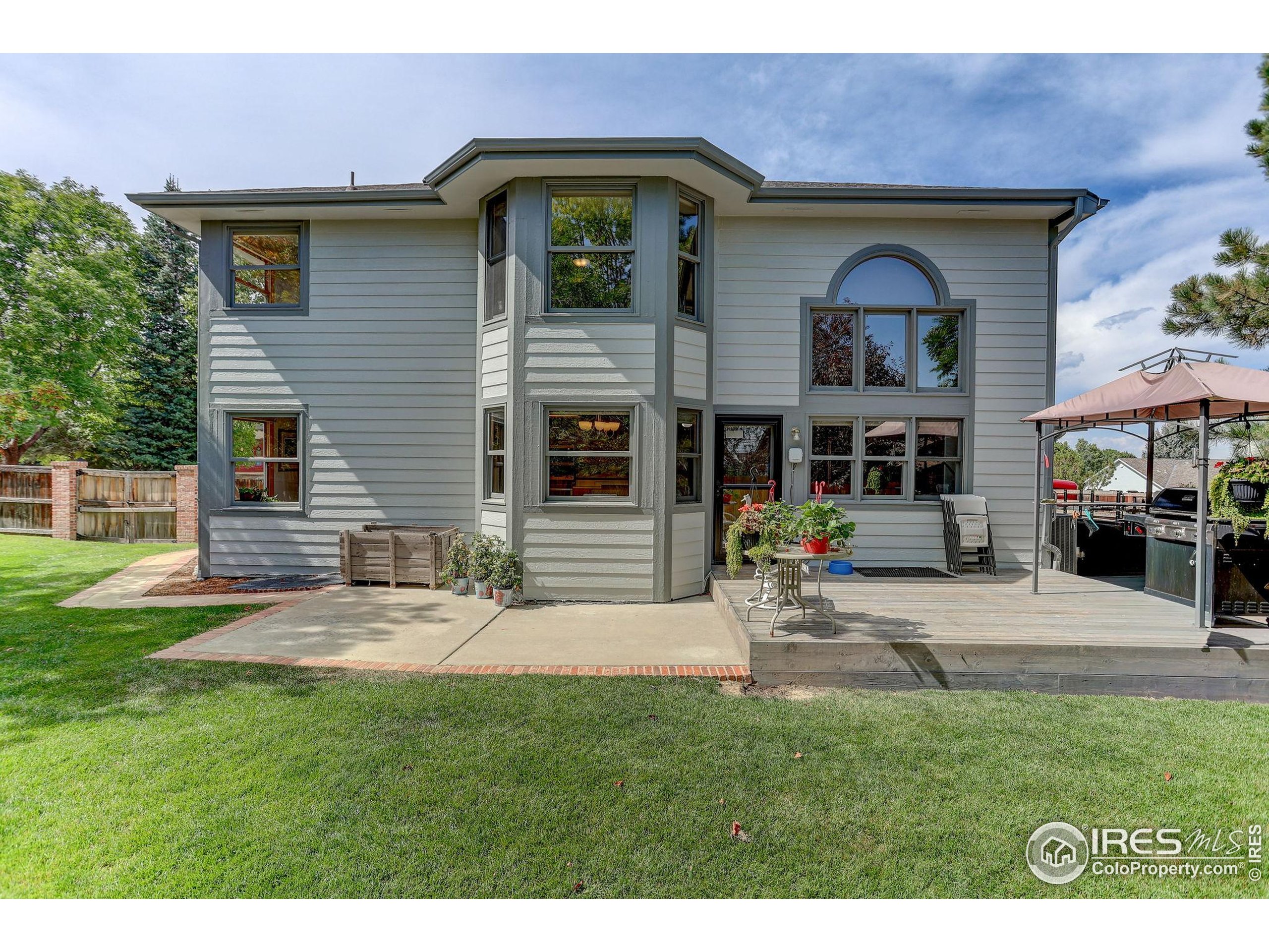 1840 Red Cloud Road Longmont, CO 80504 - Photo 33 of 42 a view of front of house with a yard
