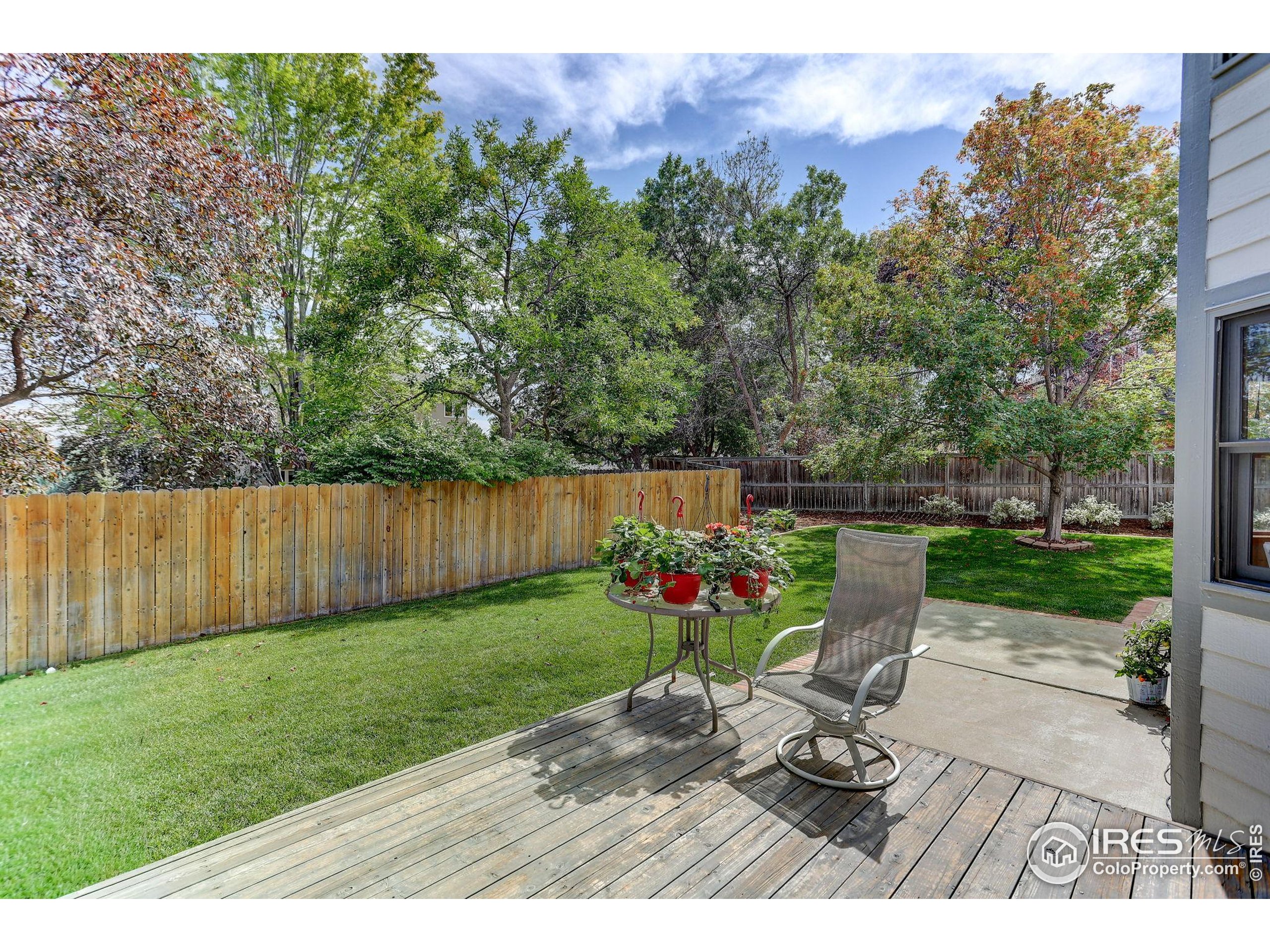 1840 Red Cloud Road Longmont, CO 80504 - Photo 36 of 42 a view of a chair and table on the garden
