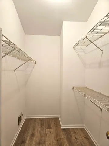 a view of a room with racks on the wall