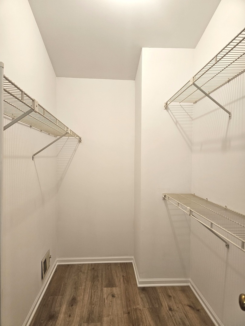 475 Bridle Trail Wheeling, IL 60090 - Photo 20 of 27 a view of a room with racks on the wall