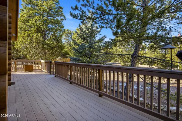 a view of balcony with wooden floor
