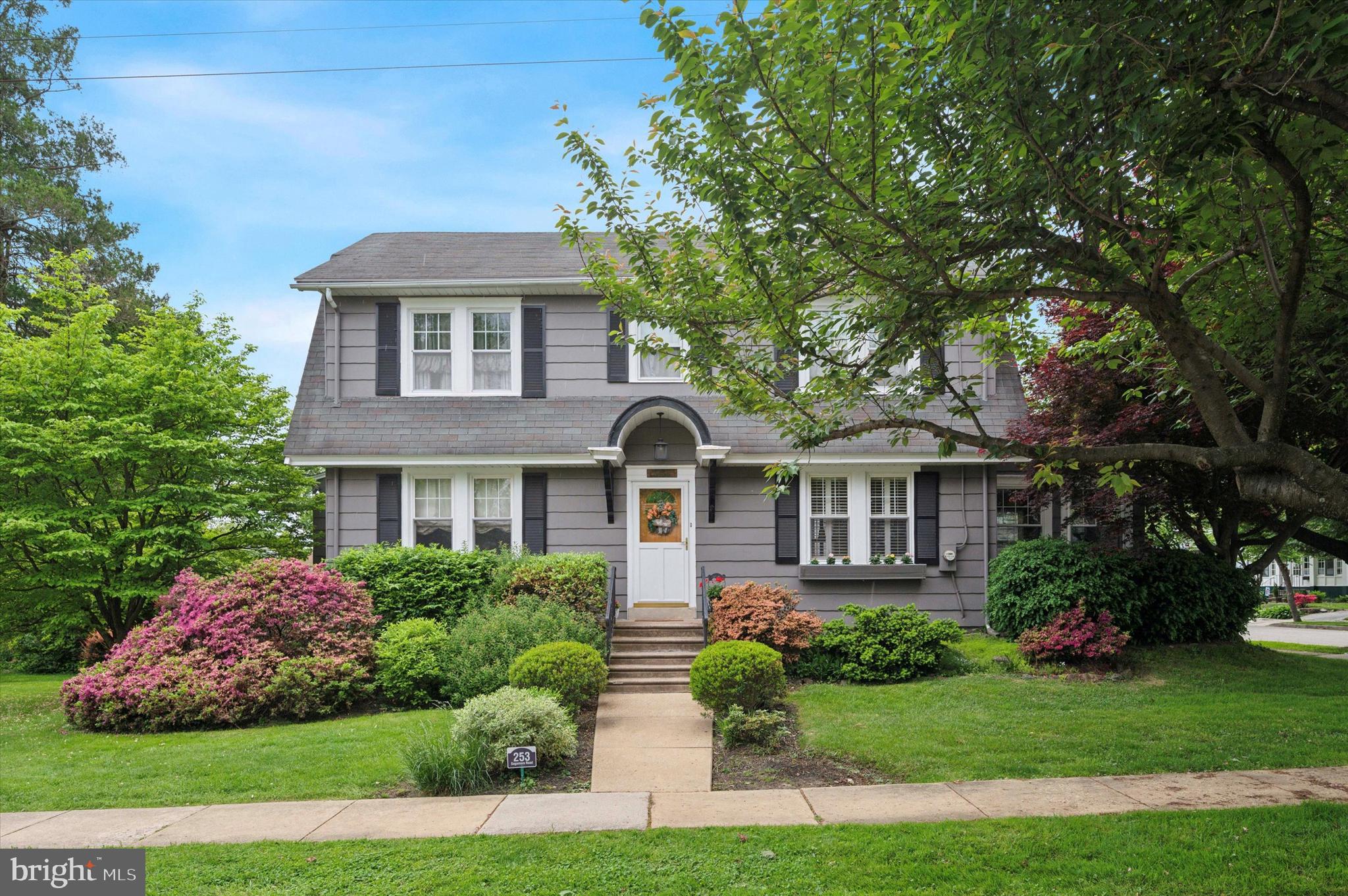 253 Sagamore Road Havertown, PA 19083 - Photo 1 of 25 a front view of a house with a yard and potted plants