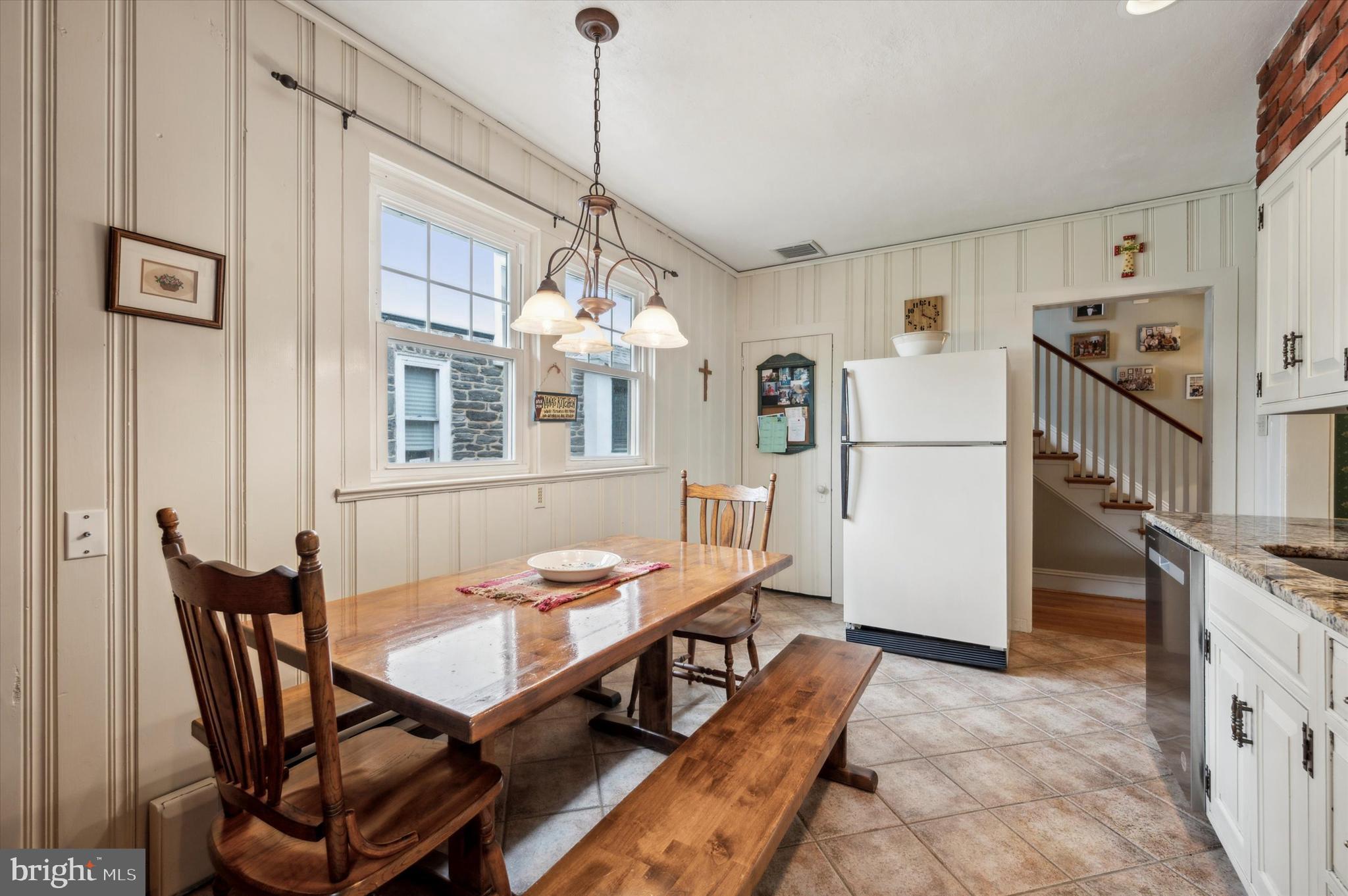 253 Sagamore Road Havertown, PA 19083 - Photo 15 of 25 a view of a dining room with furniture and a chandelier