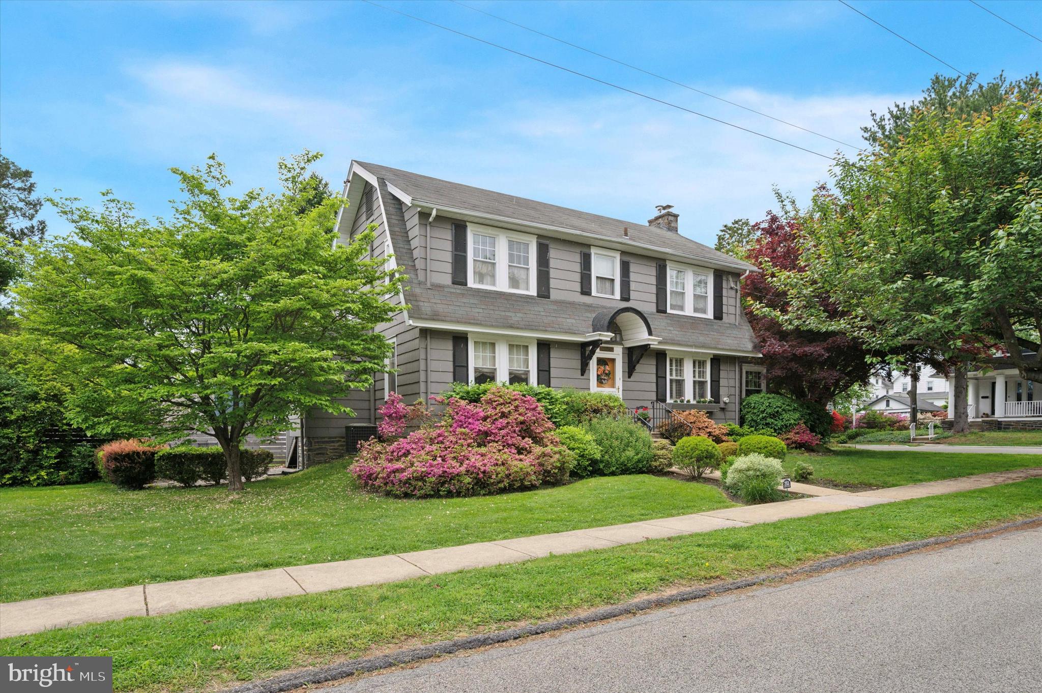 253 Sagamore Road Havertown, PA 19083 - Photo 2 of 25 a front view of a house with a garden