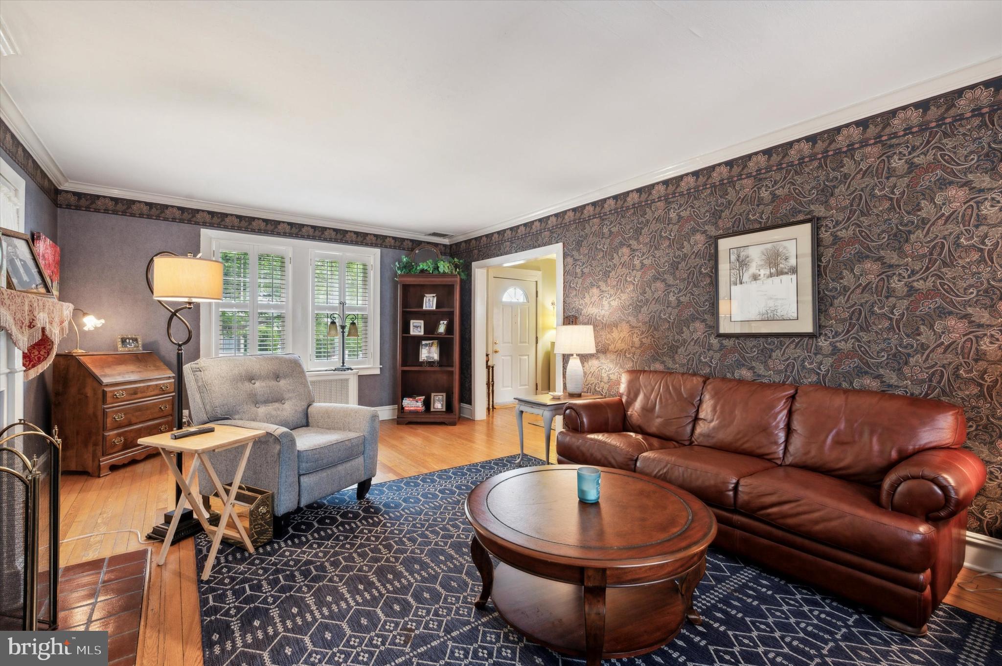 253 Sagamore Road Havertown, PA 19083 - Photo 8 of 25 a living room with furniture a rug and a window
