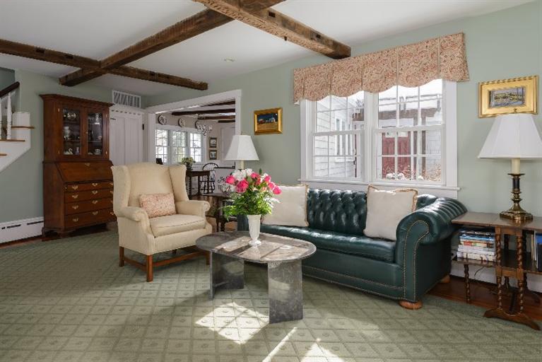 4310 Main Street Barnstable, MA 02675 - Photo 11 of 18 a living room with furniture and a potted plant
