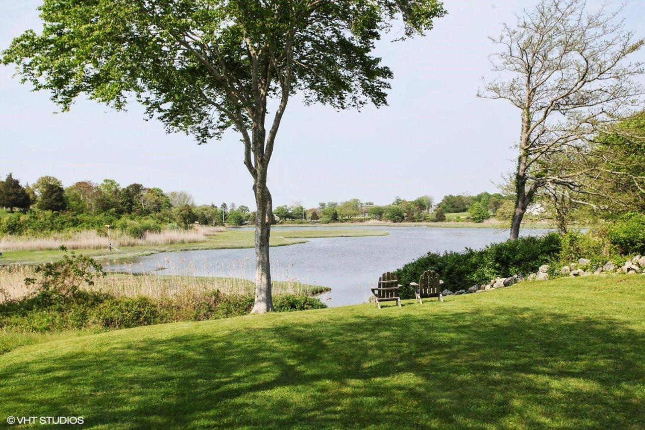 4310 Main Street Barnstable, MA 02675 - Photo 3 of 18 a view of a lake with a big yard
