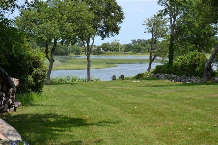 4310 Main Street Barnstable, MA 02675 - Photo 4 of 18 a view of a golf course with a lake