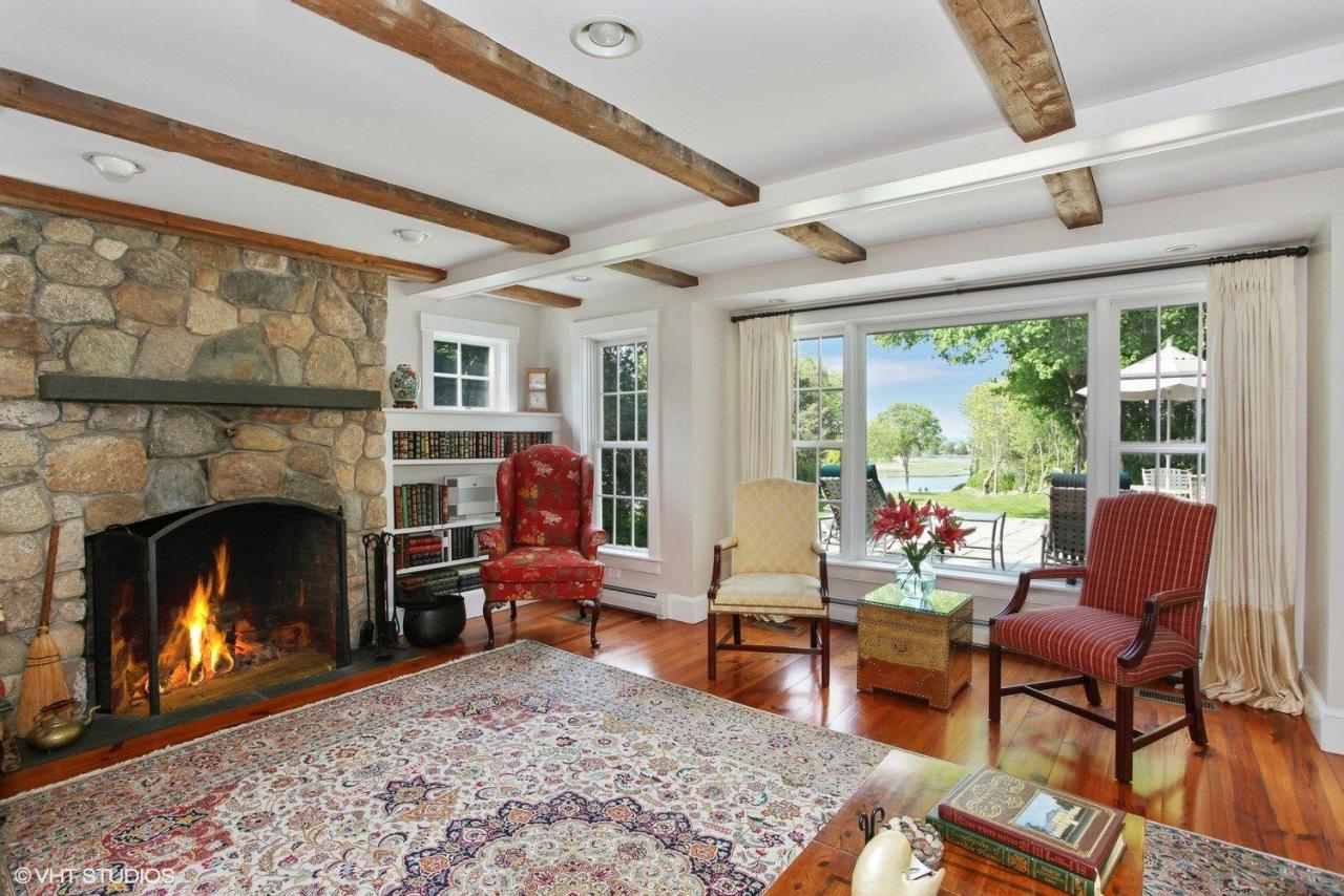4310 Main Street Barnstable, MA 02675 - Photo 6 of 18 a living room with furniture and a fireplace