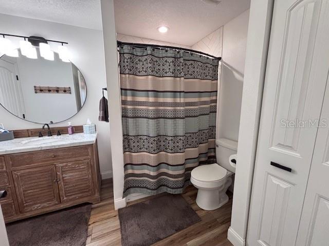 1270 Southwest 14th Street Chiefland, FL 32626 - Photo 14 of 41 a bathroom with a sink toilet and shower