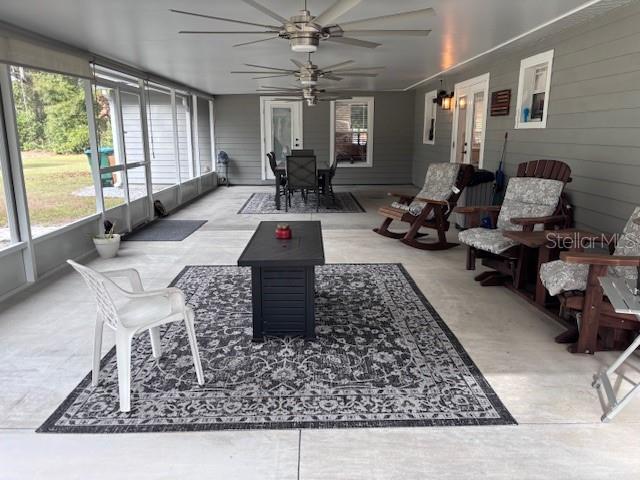 1270 Southwest 14th Street Chiefland, FL 32626 - Photo 15 of 41 a living room with furniture hard wood floor and a rug