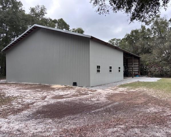 1270 Southwest 14th Street Chiefland, FL 32626 - Photo 20 of 41 a view of a house with a yard