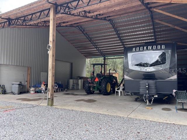 1270 Southwest 14th Street Chiefland, FL 32626 - Photo 21 of 41 a view of a room with gym equipment