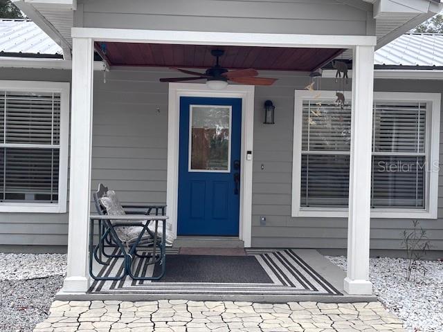1270 Southwest 14th Street Chiefland, FL 32626 - Photo 28 of 41 a front view of a house with chairs and a rug
