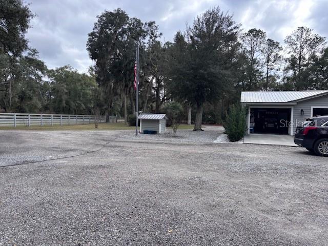 1270 Southwest 14th Street Chiefland, FL 32626 - Photo 38 of 41 a view of outdoor space with deck and tree