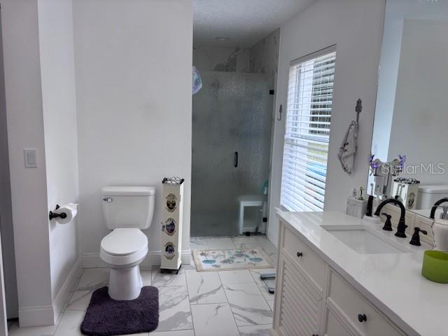 1270 Southwest 14th Street Chiefland, FL 32626 - Photo 9 of 41 a bathroom with a sink and a toilet
