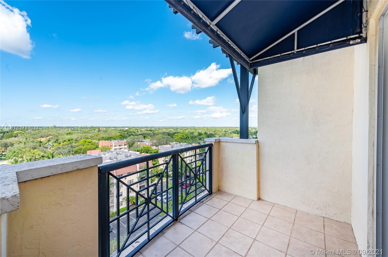 9021 Southwest 94th Street, Unit PH07 Miami, FL 33176 - Photo 23 of 32 a view of city from a balcony