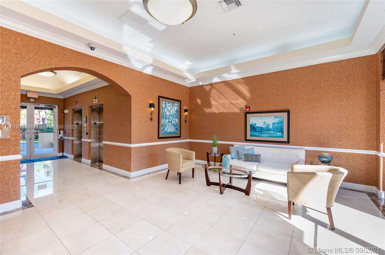 9021 Southwest 94th Street, Unit PH07 Miami, FL 33176 - Photo 30 of 32 a living room with furniture and a table