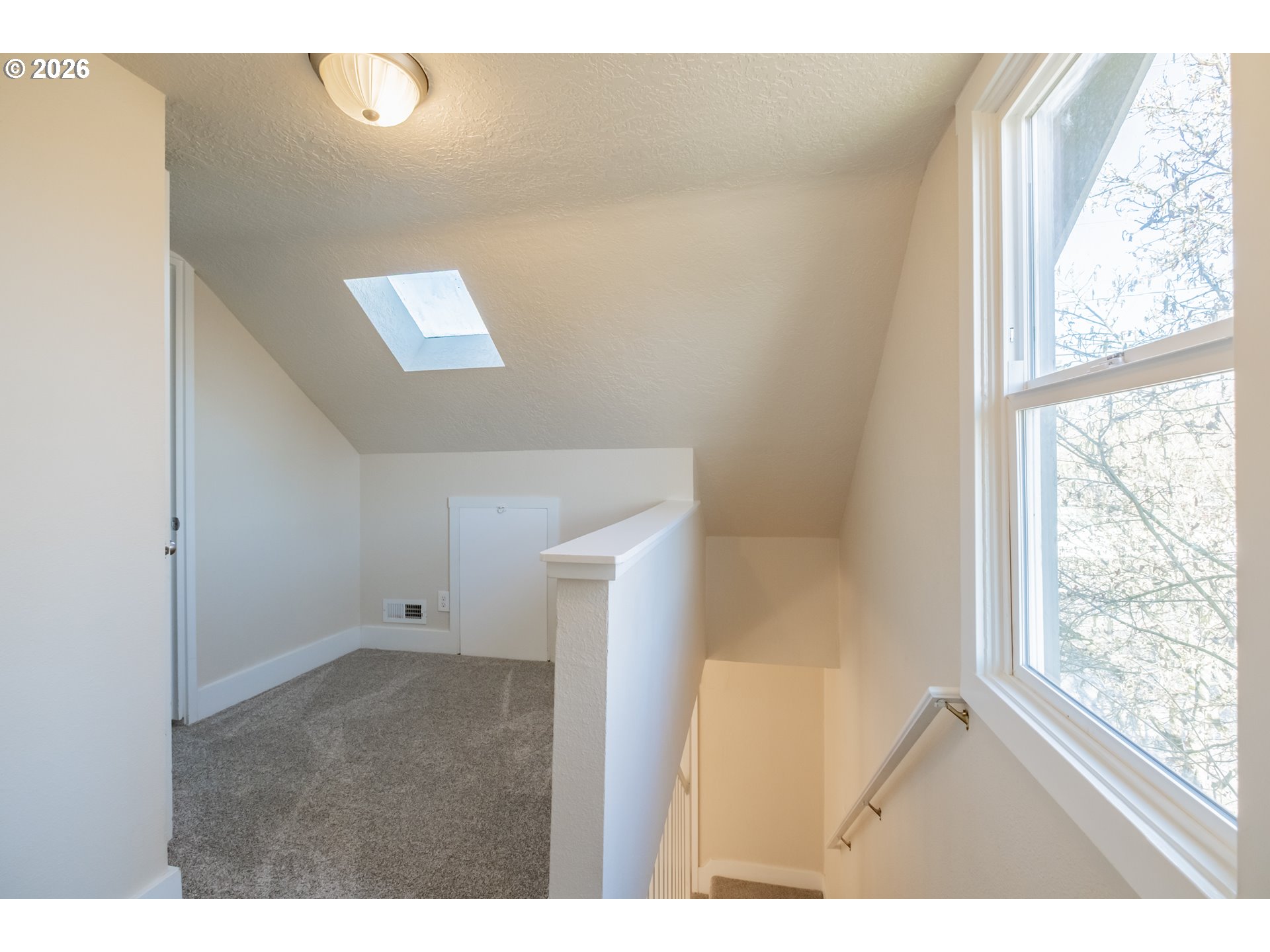 3392 Sunnyview Road Northeast Salem, OR 97301 - Photo 17 of 47 a view of an empty room with a window