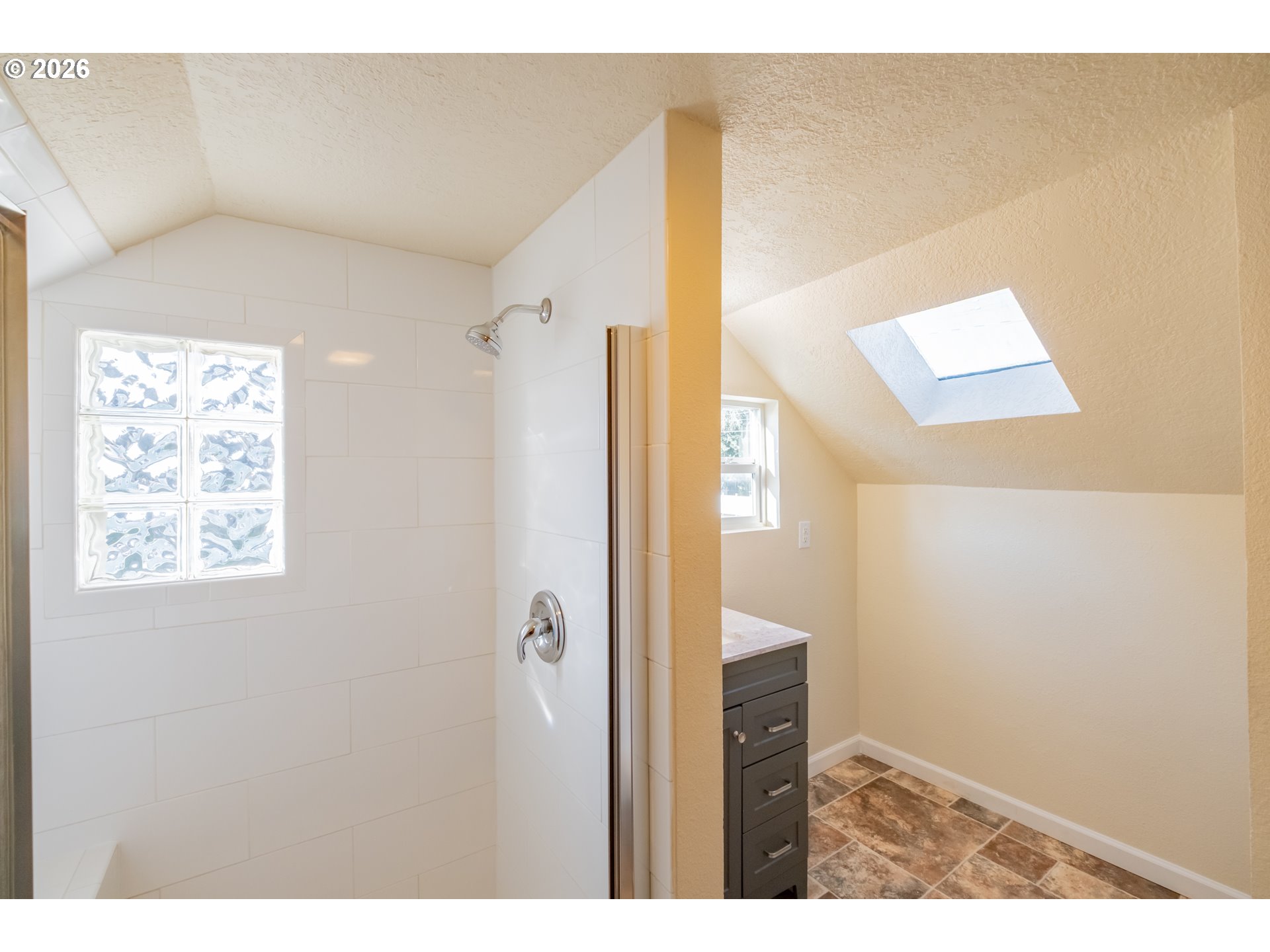 3392 Sunnyview Road Northeast Salem, OR 97301 - Photo 21 of 47 a view of a bathroom from a hallway