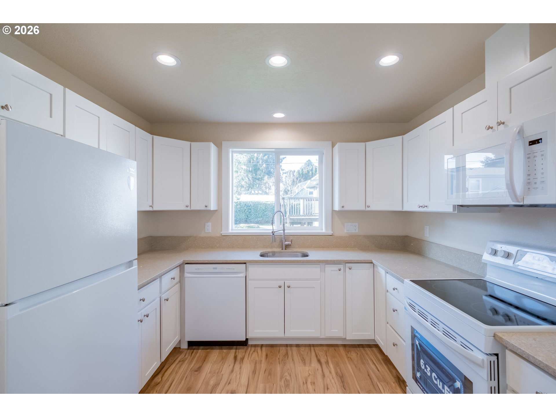 3392 Sunnyview Road Northeast Salem, OR 97301 - Photo 37 of 47 a kitchen that has a sink and cabinets in it