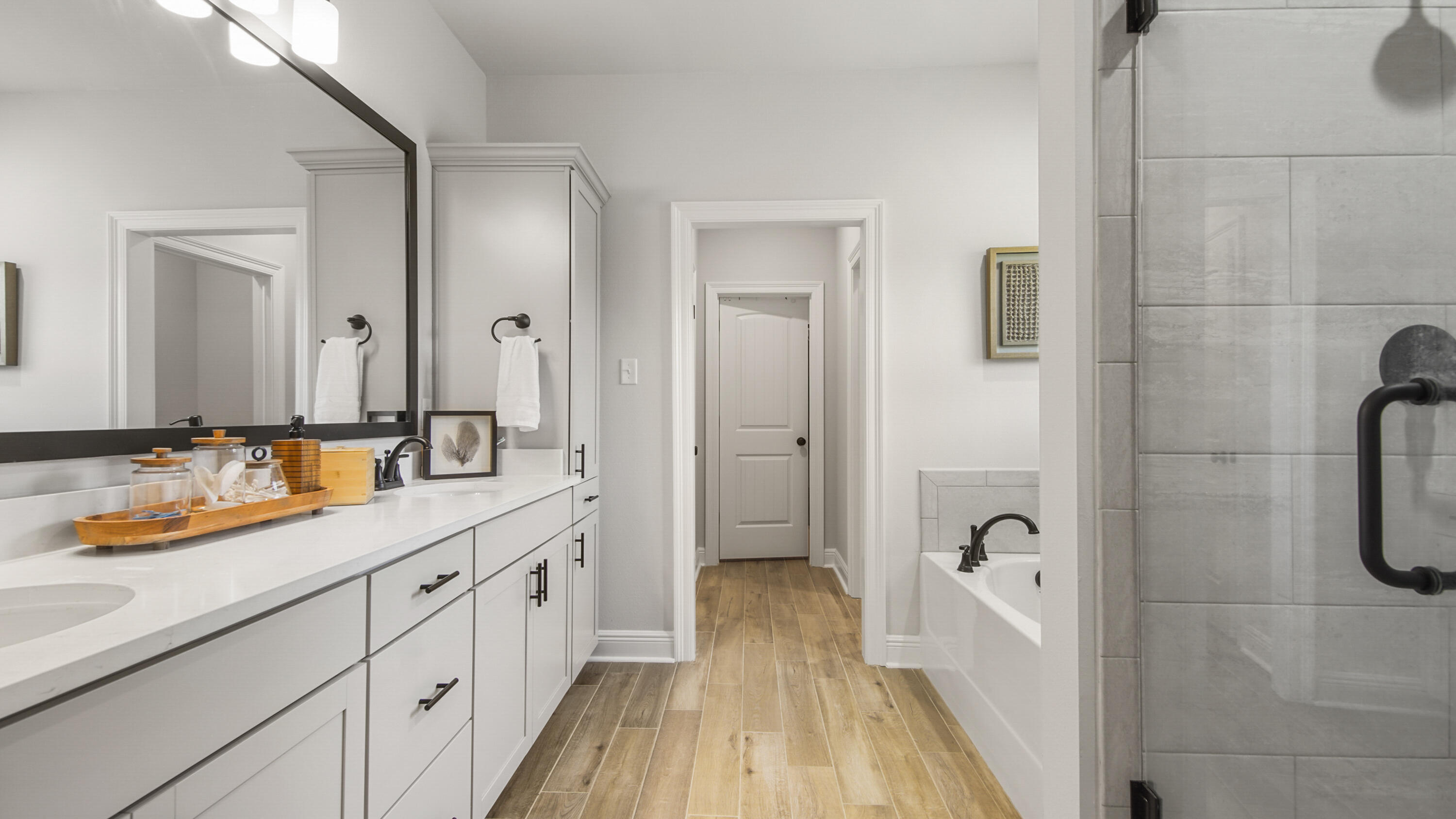 115 Flora Lane Freeport, FL 32439 - Photo 14 of 69 a spacious bathroom with a tub sink and mirror
