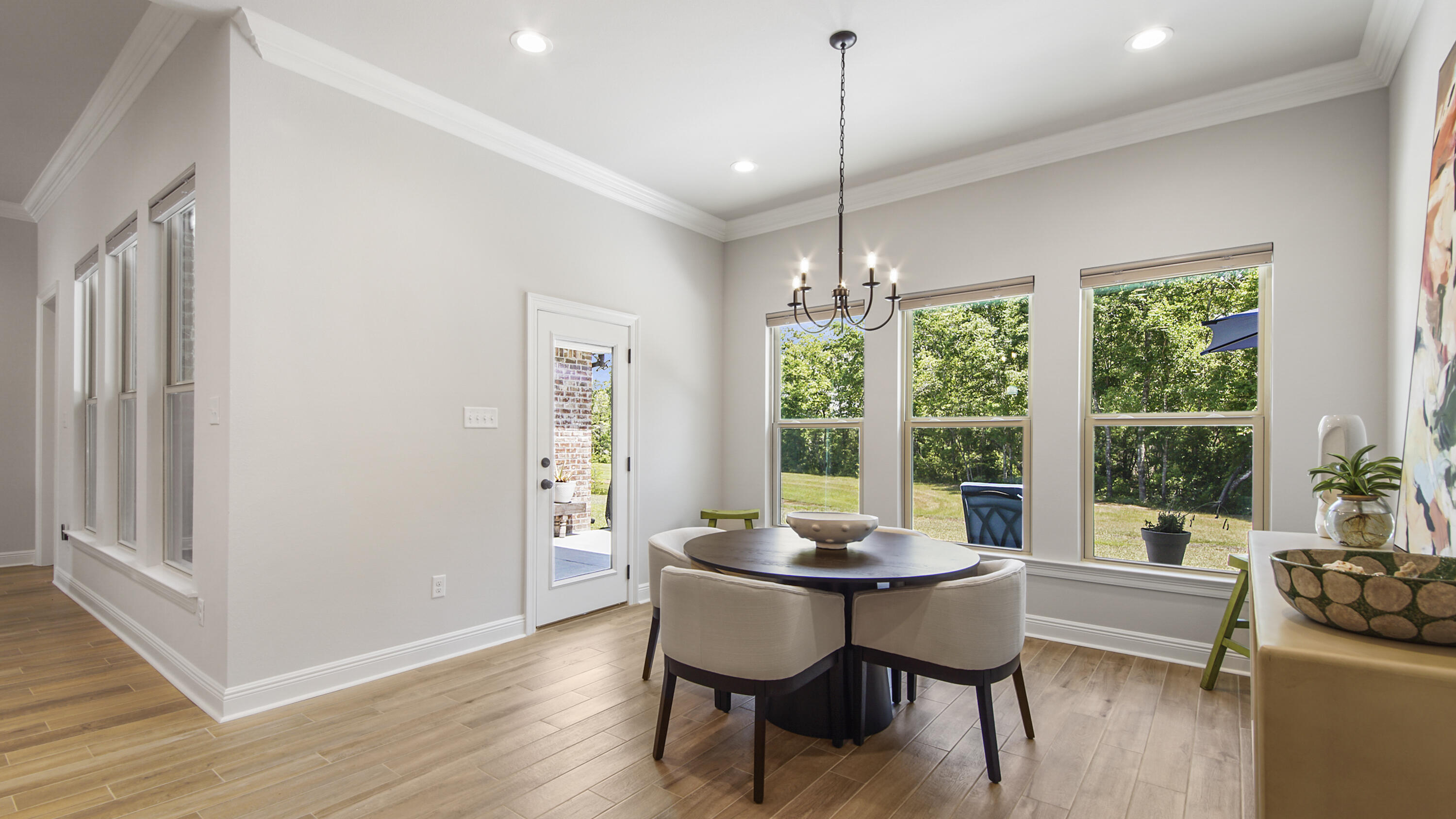 115 Flora Lane Freeport, FL 32439 - Photo 21 of 69 a view of a dining room with furniture window and outside view