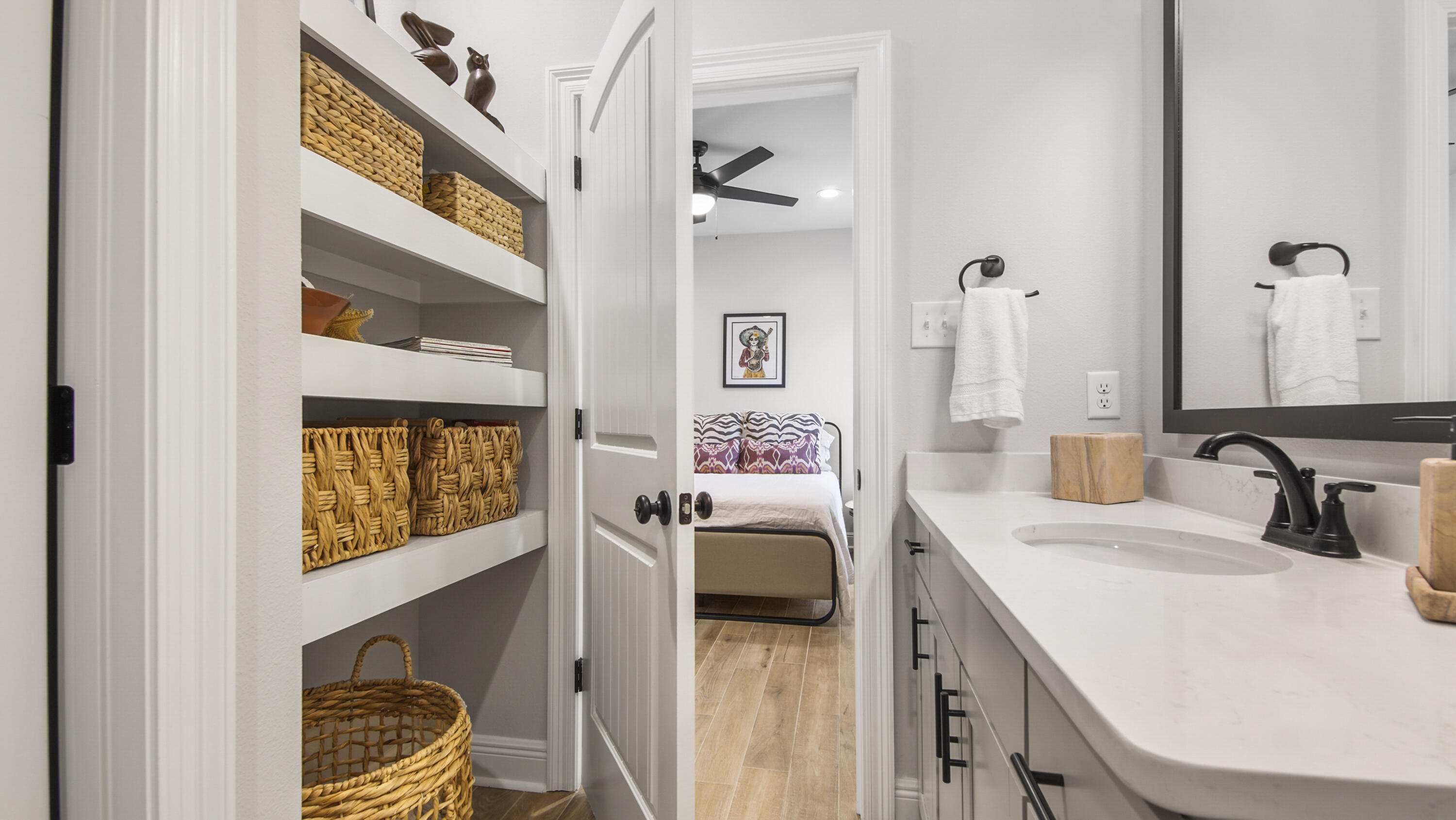 115 Flora Lane Freeport, FL 32439 - Photo 29 of 69 a en suite bathroom with a sink and a mirror