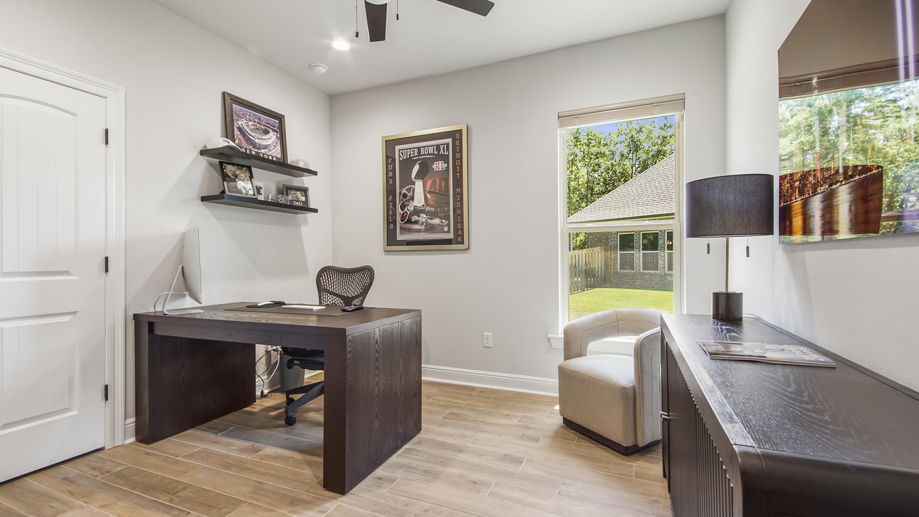 115 Flora Lane Freeport, FL 32439 - Photo 35 of 69 a view of a workspace with furniture and a window