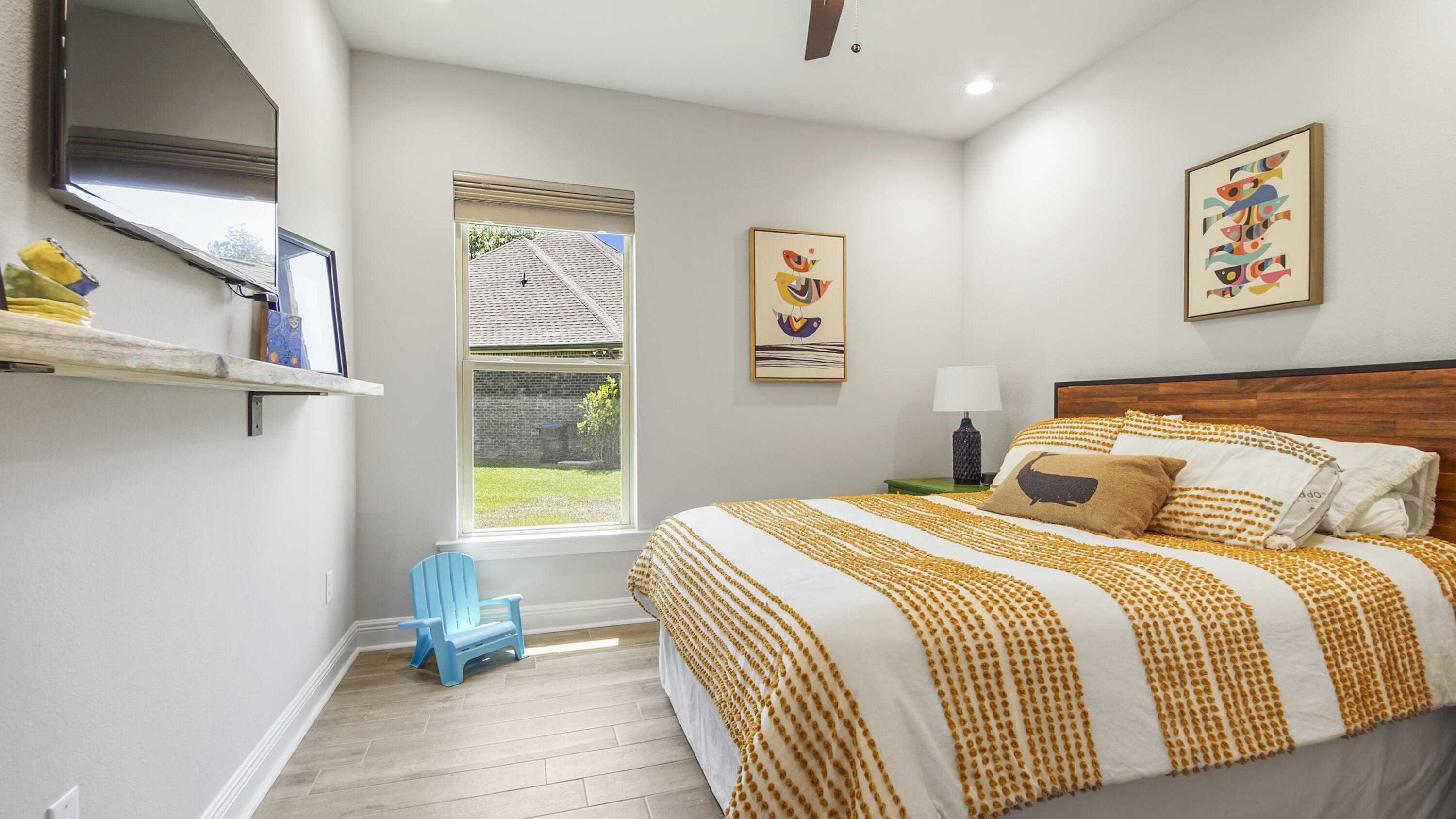 115 Flora Lane Freeport, FL 32439 - Photo 44 of 69 a bedroom with a bed and a window