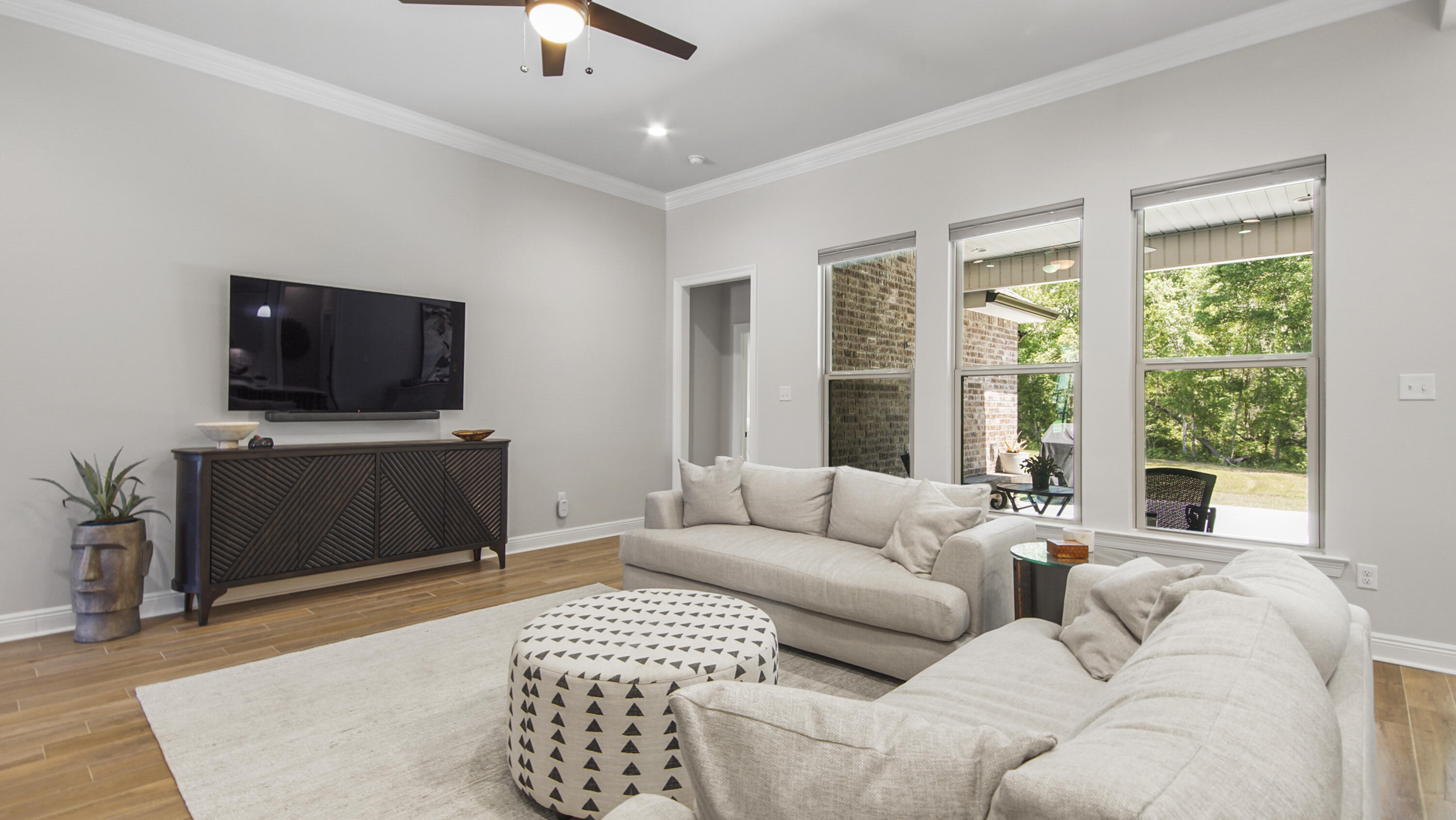 115 Flora Lane Freeport, FL 32439 - Photo 46 of 69 a living room with furniture and a flat screen tv