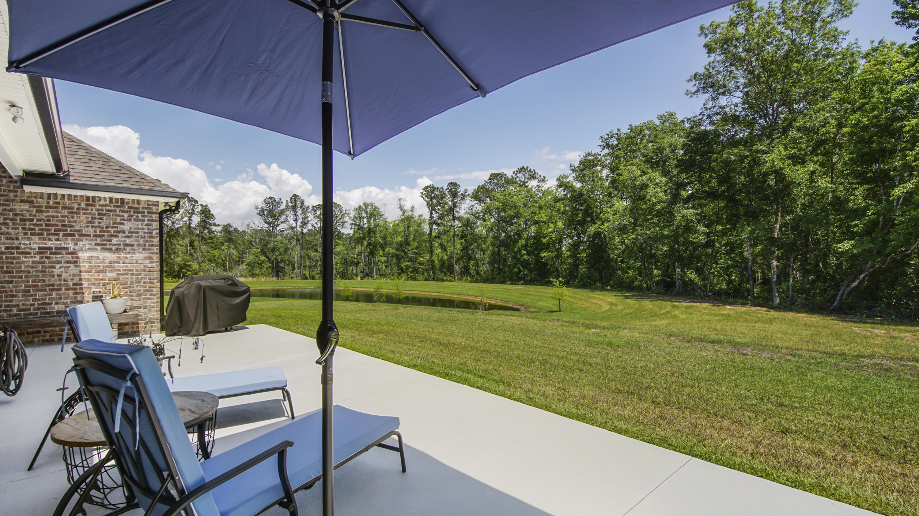 115 Flora Lane Freeport, FL 32439 - Photo 51 of 69 a view of a patio with a backyard