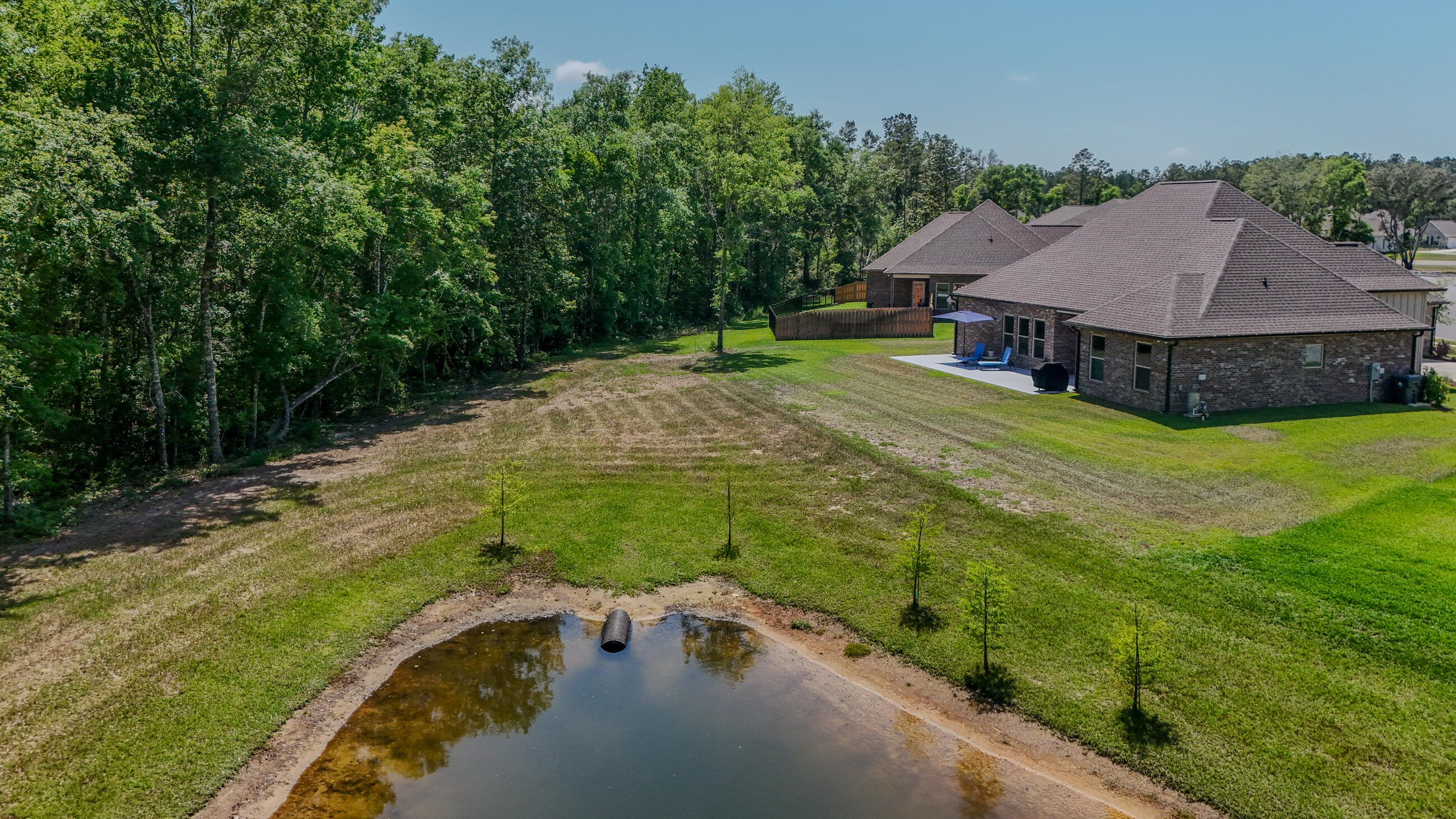 115 Flora Lane Freeport, FL 32439 - Photo 62 of 69 a view of a house with a yard